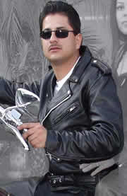 MAN ON BIKE WEARING A C102 LEATHER BIKER JACKET